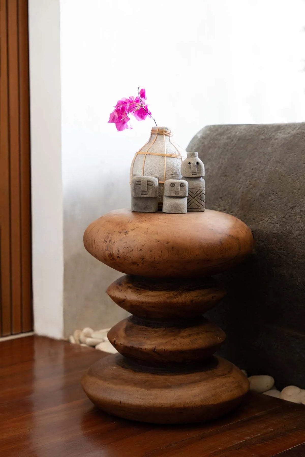 Rounded Tiered Wooden Stool used as a beside table. Handmade UK Interior Design and supply