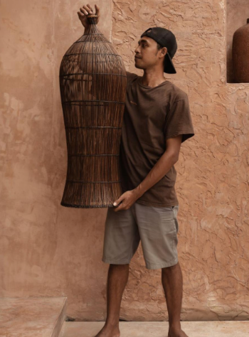 Dark Rattan Extra Large Pendant Ceiling Light being held