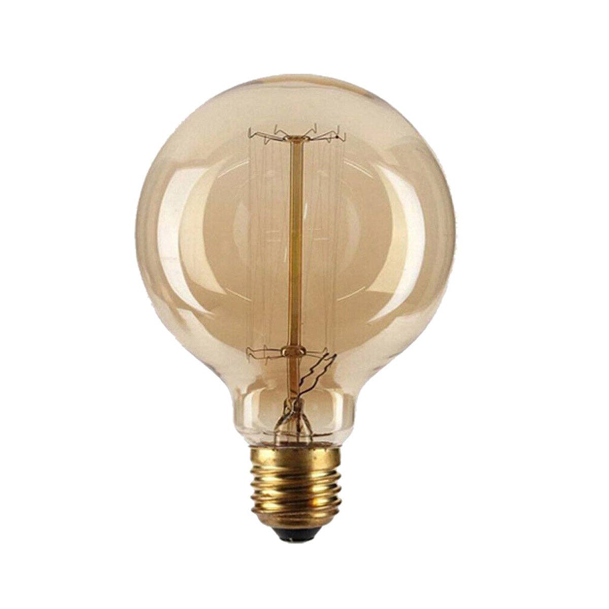 A classic round led light bulb with a warm amber tinted glass envelope and a brass screw base, shown against a solid white background.