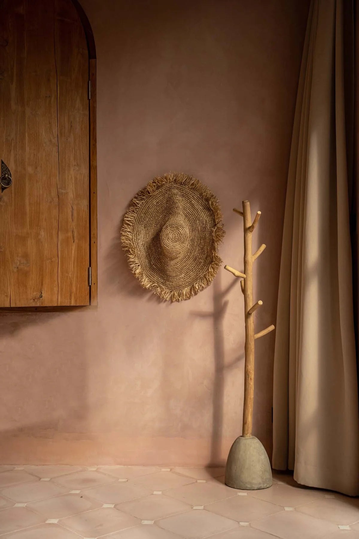 The concrete teak coat stand