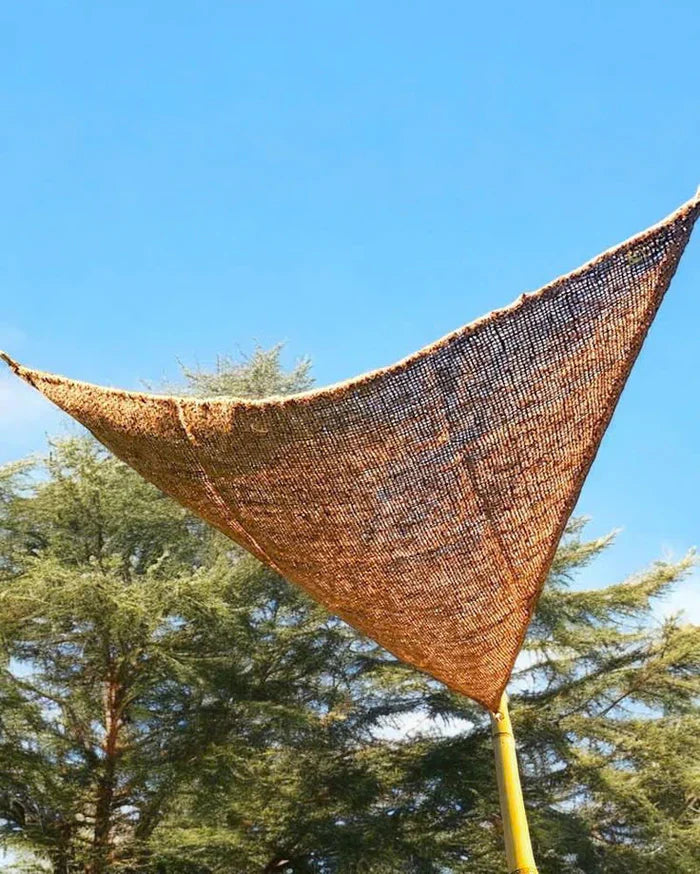 Triangle sun shade made from water repellent coco fibre or coir