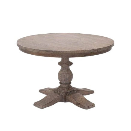 classic round wooden dining table with carved base, seats 4 and is 120cm in diameter