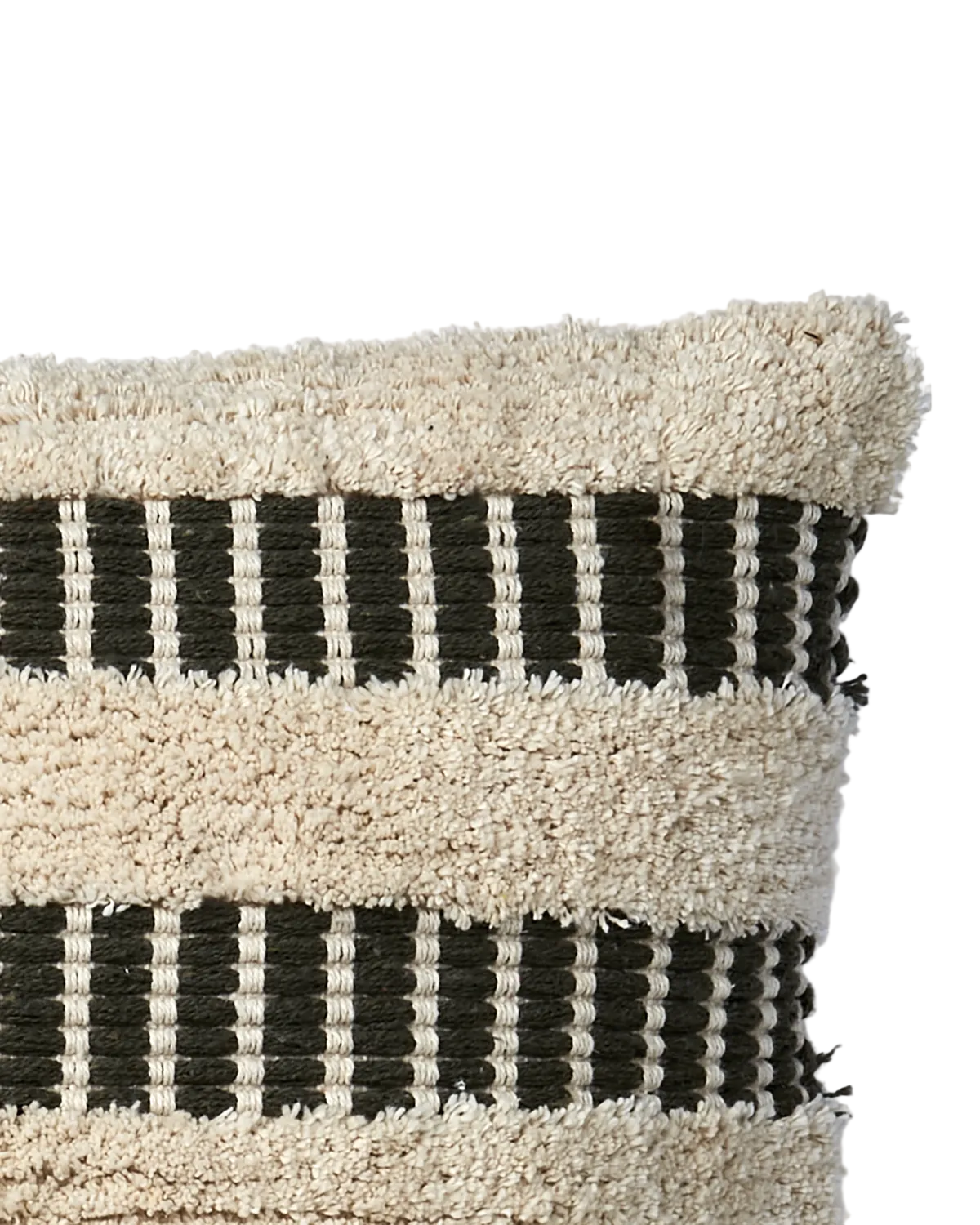 Close up of a textured sofa cushion with green and beige stripes on a white background