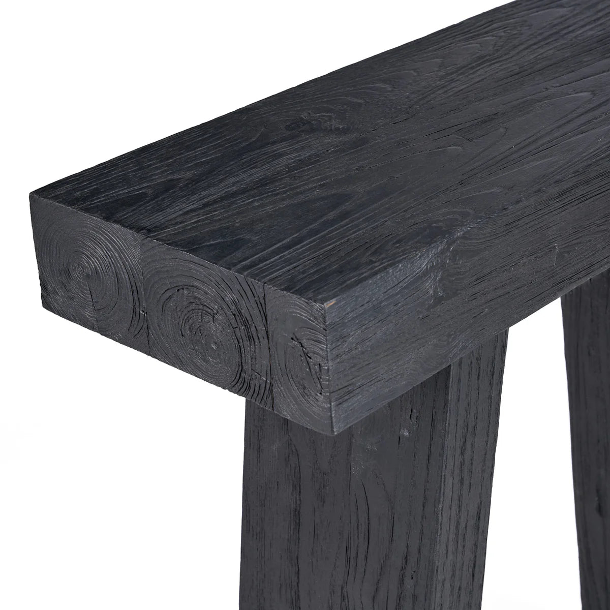Dark wooden console table with a white background
