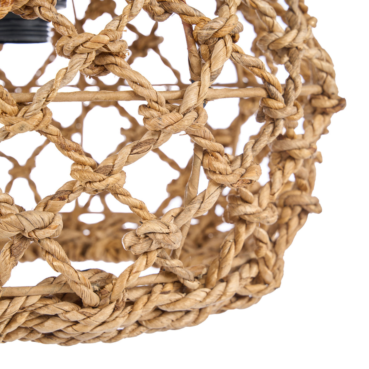 Close up of a woven rope light fixture on a white background