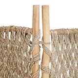 Close-up of a woven room divider screen with wooden sticks on a white background