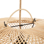 Close-up of a woven rattan ceiling light fixture with black metal accents on a white background.