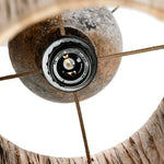 Close-up of a table lamp with a metallic e27 bulb holder on a white background