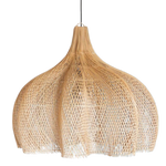 Woven wicker rattan pendant light on a white background