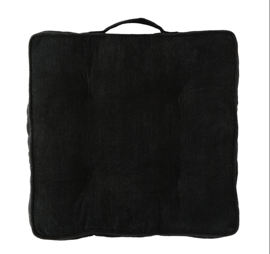 Black corduroy cushion with a handle 
