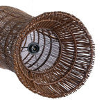 Close-up of a wicker rattan light shade with a white background