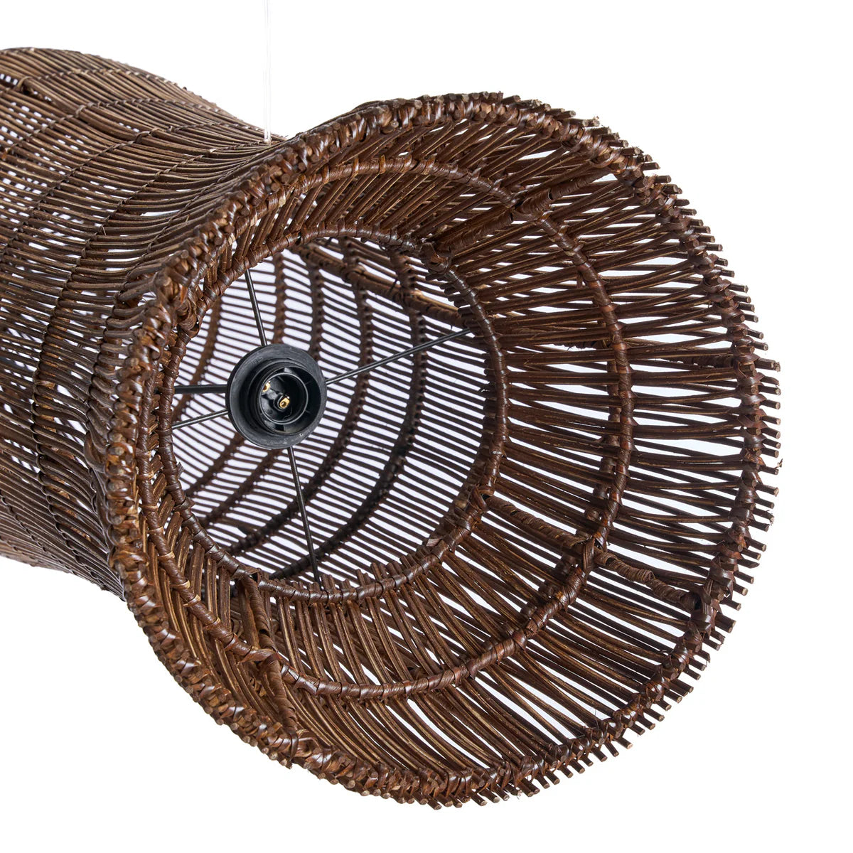 Close up of a wicker rattan light shade with a white background