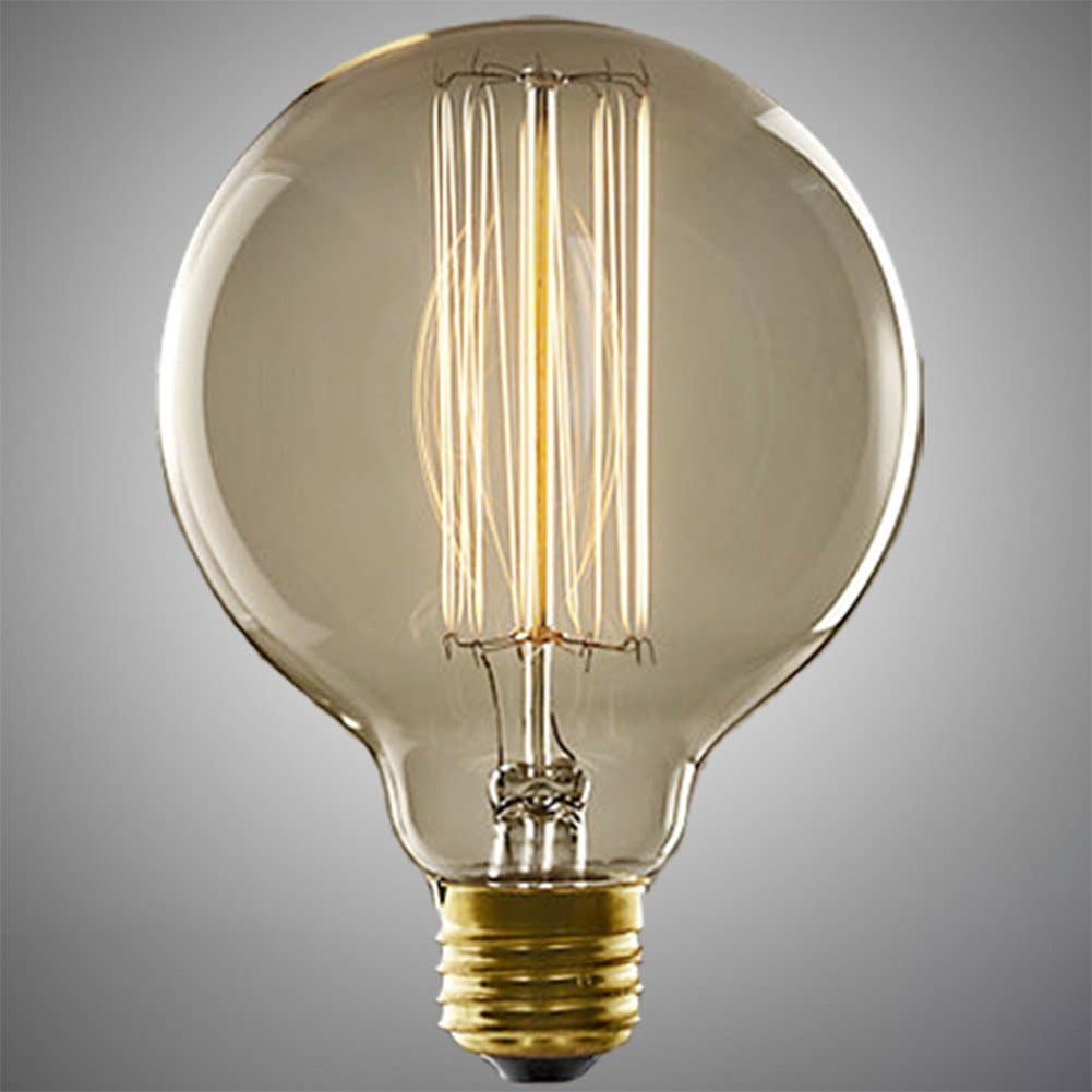A classic round glass light bulb with a warm glowing filament and a gold screw base, shown against a neutral gray gradient background.