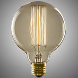 A classic round glass light bulb with a warm glowing filament and a gold screw base, shown against a neutral gray gradient background.
