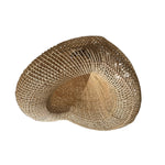 Heart-shaped woven wicker light shade on a white background