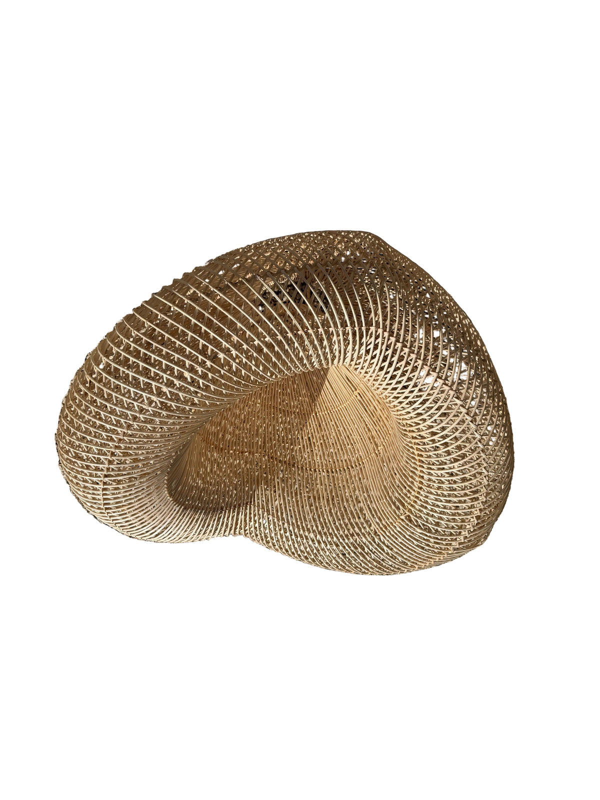 Heart shaped woven wicker light shade on a white background