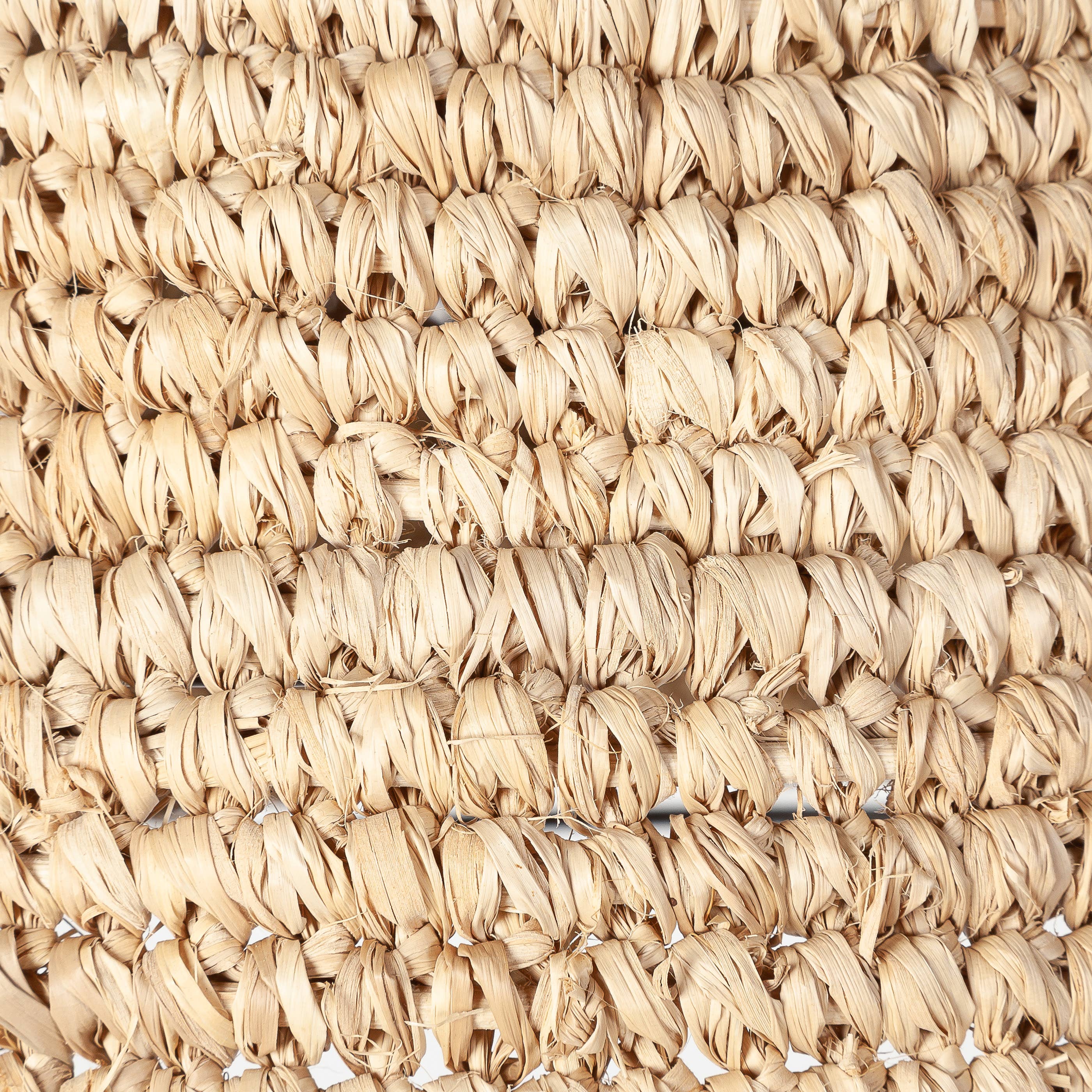 A large dome natural raffia rattan large light shade hanging in a living room - UK