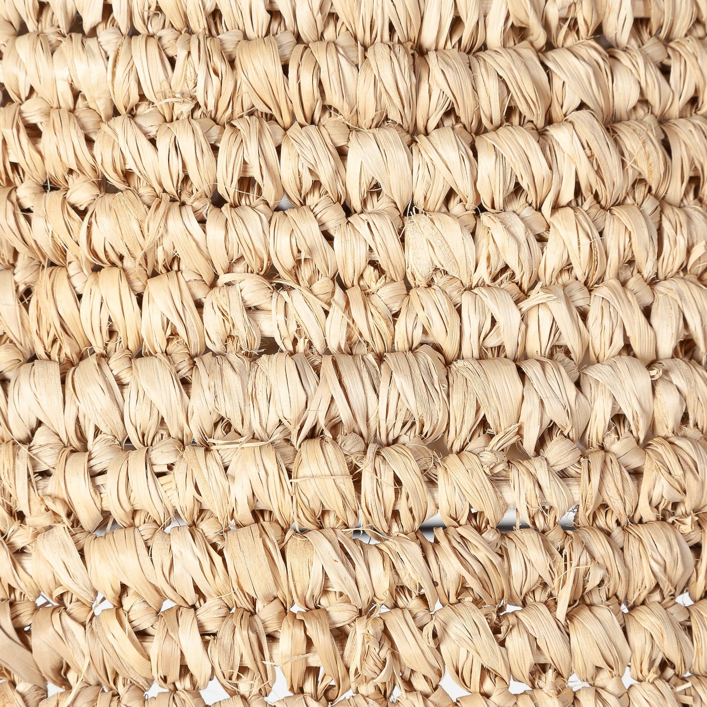 A large dome natural raffia rattan large light shade hanging in a living room - UK