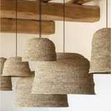 A collection of natural woven seagrass rattan ceiling light shades in sizes small medium and large