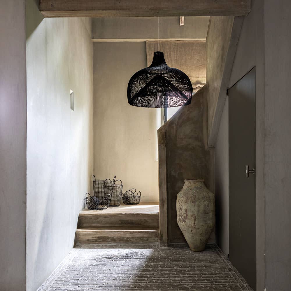 Extra large black rattan lobster pendant light shade -in wabi sabi hallway Flo & Joe UK Store