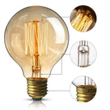 A large clear glass LED filament light bulb with a brass screw base, shown on a white background with three circular inset close-ups highlighting the internal filaments, base detail, and connection area.