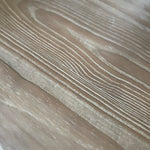 classic round wooden dining table with carved base, seats 4 and is 120cm in diameter