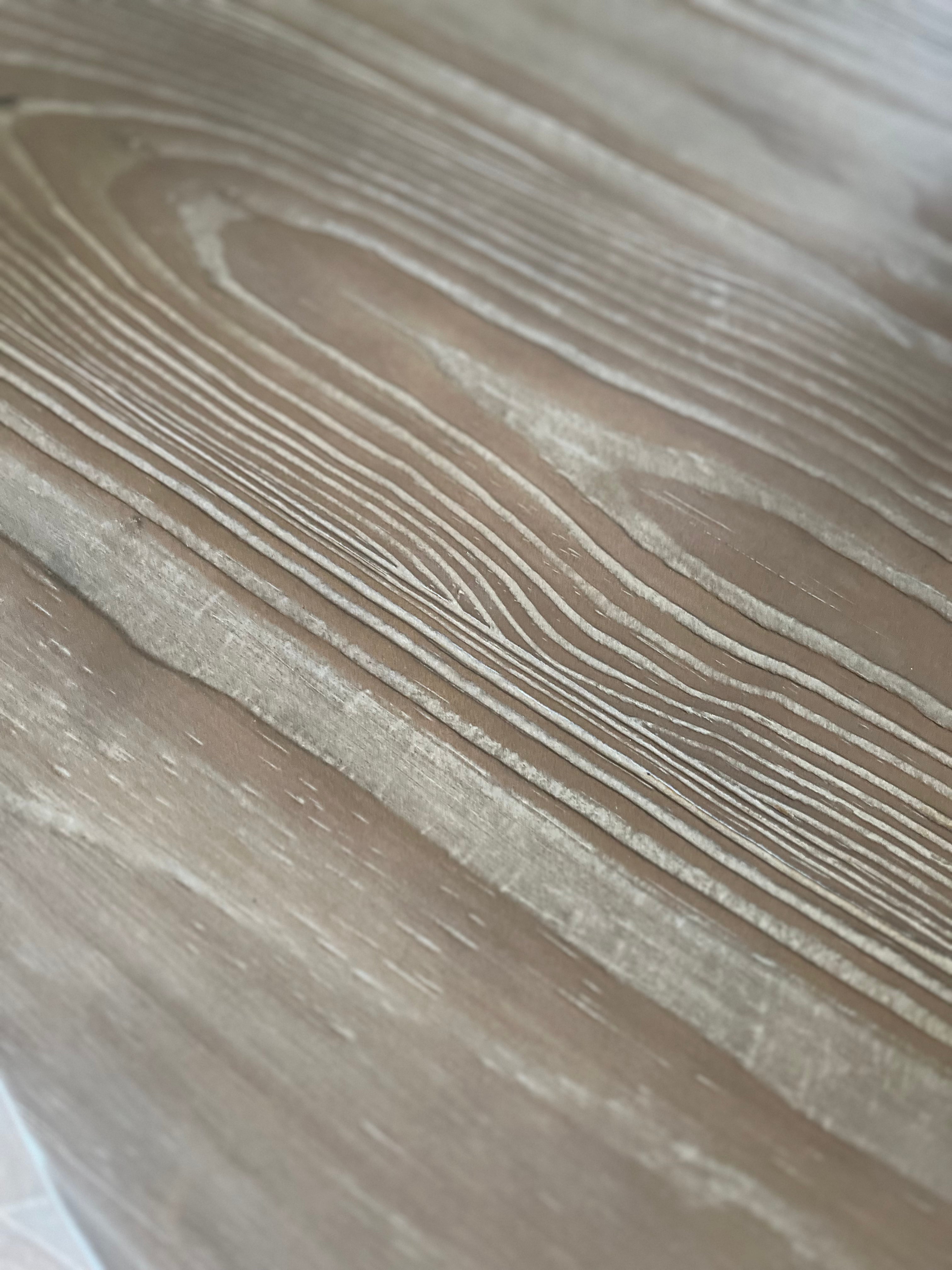 classic round wooden dining table with carved base, seats 4 and is 120cm in diameter