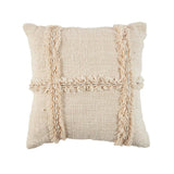 Beige pillow with decorative shell pattern on a white background