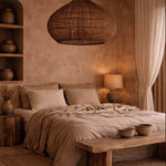 bedroom with rustic decor, including a woven rattan pendant light, wooden bench, and neutral bedding.