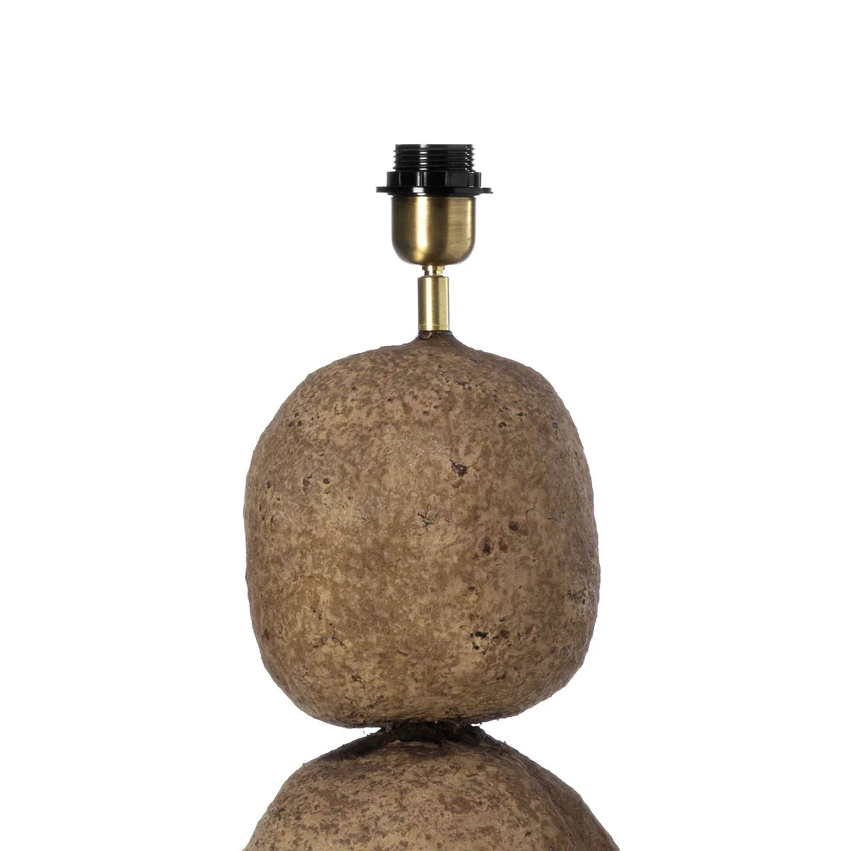 Rustic stone lamp with brass fitting on a white background