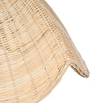 Close-up of a woven natural material product on a white background