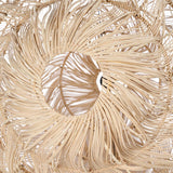 Close-up of a beige woven rattan  lampshade with a circular design.