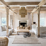 The Large Lombok Rattan Light Shade - in a modern rustic living room -Flo & Joe