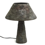 Cement table lamp with a textured design on a white background