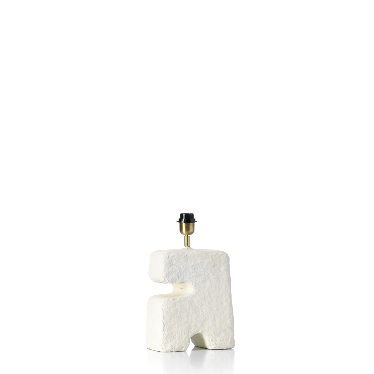 Modern table lamp with a textured white base and gold accents on a white background