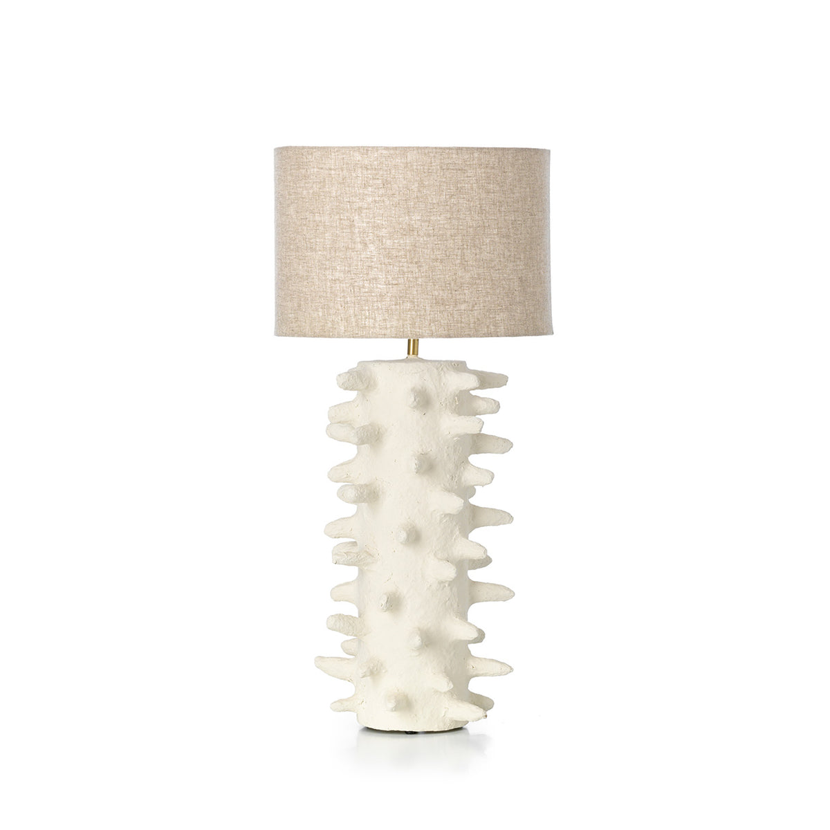Table lamp with unique white textured base and beige lampshade   bedside or table